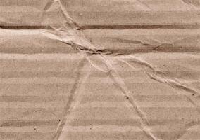 verfrommeld bruin kraft papier structuur banier achtergrond foto