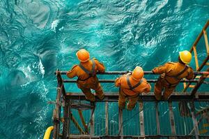 ai gegenereerd groep van olie tuigage arbeiders gekleed in beschermend versnelling, gezamenlijk probleemoplossen een stuk van machinerie Aan de dek van een offshore olie tuigage foto