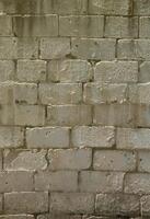 structuur van steen muur van Verlichting stenen onder helder zonlicht foto