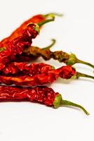 droog rood Chili peper, veel een uitkering, stimuleert de eetlust en bloed circulatie, verlicht spier pijn, antibacterieel, paprika annuum foto