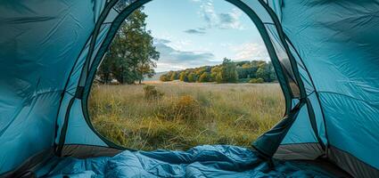 ai gegenereerd ochtend- visie van binnen een tent in een vredig weide foto