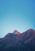 licht van zonsondergang Aan de Himalaya foto