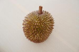 durian fruit Aan de hout tafel, detailopname van foto