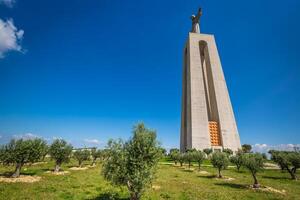 de Christus de koning standbeeld in Lissabon, Portugal foto