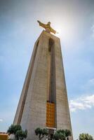 de Christus de koning standbeeld in Lissabon, Portugal foto