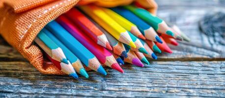 ai gegenereerd groep van gekleurde potloden in blauw geval foto