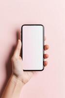 ai gegenereerd hand- Holding een smartphone met een blanco scherm tegen een pastel roze achtergrond foto