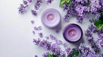 ai gegenereerd twee potten van Purper aromatisch kaarsen omringd door lavendel bloemen en lila struik Aan wit achtergrond met kopiëren ruimte. vlak leggen samenstelling foto