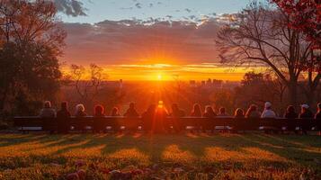 ai gegenereerd groep van mensen zittend in park Bij zonsondergang foto