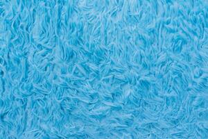 stralend synthetisch blauw vacht, een verbijsterend textuur. foto