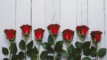 ai gegenereerd elegant grens van weinig rood rozen tegen ongerept wit backdrop foto
