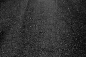 abstract asfalt, getextureerde zwart achtergrond. foto
