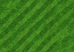 levendig groen gras structuur van Amerikaans voetbal en voetbal veld- omhoog dichtbij. foto