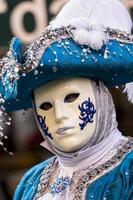 Venetië, Italië, 10 februari 2013 - niet-geïdentificeerde persoon met Venetiaans Carnaval-masker in Venetië, Italië. in 2013 wordt het gehouden van 26 januari tot 12 februari foto