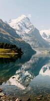 ai gegenereerd besneeuwd pieken gespiegeld in alpine wateren foto