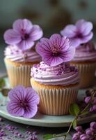 ai gegenereerd cupcakes met roze bloemen Aan bord foto