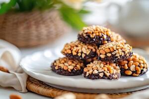 ai gegenereerd kuki's kacang coklat. chocola pinda koekjes. Indonesisch eid koekjes kue Lebaran foto