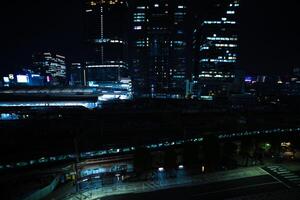 een nacht panoramisch stadsgezicht in voorkant van tokyo station breed schot foto