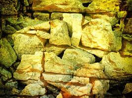 structuur van geel steen in de tuin foto