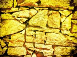 structuur van geel steen in de tuin foto