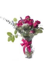 boeket van rozen in arrangement in vaas foto