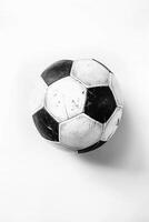 ai gegenereerd een voetbal bal Aan een wit oppervlak, sport- uitrusting in zwart en wit foto