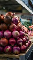 ai gegenereerd stack van rood uien Aan markt kraam, vers produceren foto verticaal mobiel behang