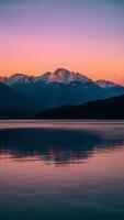 ai gegenereerd bergen voorzien verbijsterend backdrop naar sereen zonsondergang over- water verticaal mobiel behang foto