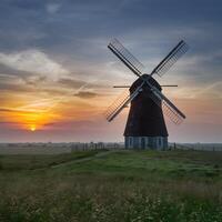 ai gegenereerd windmolen land landschap Bij zonsondergang inspireert met haar schoonheid voor sociaal media post grootte foto