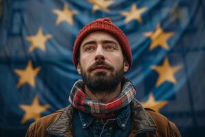 ai gegenereerd een Europese unie patriot, vervelend een rood hoed en sjaal, staat trots met de vlag in de achtergrond foto