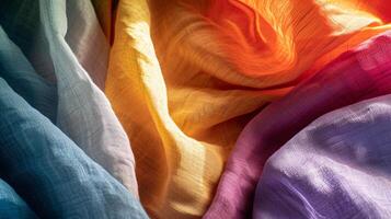 de tactiel charme van een gekleurde kleding stof texturen, met een focus Aan netjes gevouwen linnen foto