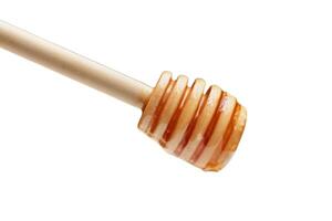 houten lepel honing geïsoleerd Aan wit achtergrond foto