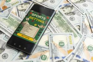 dollars en euro, smartphone met sport- inzet toepassing foto