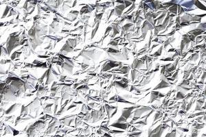 verfrommelde witte aluminiumfolie achtergrond foto
