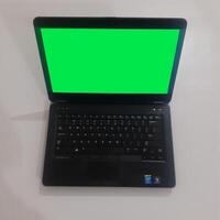 groen scherm laptop - voorraad foto