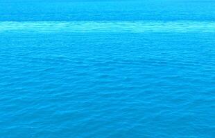blauw zee water Golf achtergrond foto