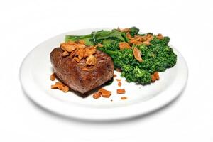 filet Doen moraal, gegrild hoog filet met broccoli en gebakken knoflook foto