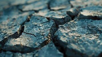 gebarsten grond land- met droog en gebarsten grond foto