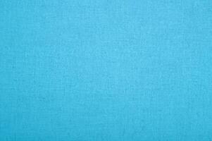 sereen licht blauw katoen kleding stof textuur, natuurlijk textiel patroon. foto