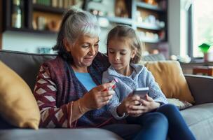 grootmoeder en kleindochter met glucometer foto