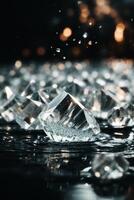 diamanten Aan een zwart oppervlakte met water foto