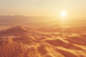 zonsondergang over- gouden woestijn duinen foto