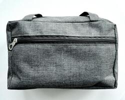 etui of zak kleding stof met grijs kleur Aan wit achtergrond foto