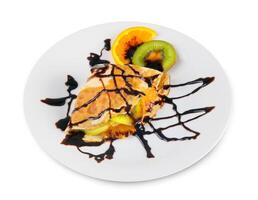 crêpe met kiwi en oranje foto