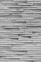 grijs steen structuur of achtergrond in monochroom. foto
