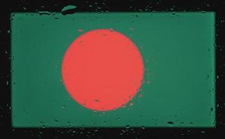 druppels water op de vlagachtergrond van Bangladesh. ondiepe scherptediepte. selectieve aandacht. afgezwakt. foto
