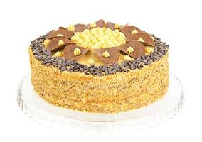 heerlijke honingcake versierd met chocolade. foto