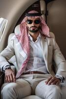 Arabisch zakenman in een privaat Jet foto