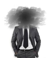 zakenman met hoofd in de wolken foto