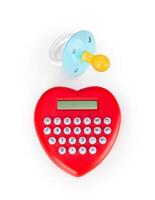 rekenmachine hart vormig en fopspeen. foto